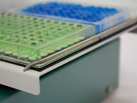 Close up of Ratek MPS1 Microtiter/PCR Plate Shaker showing stainless steel locating spring